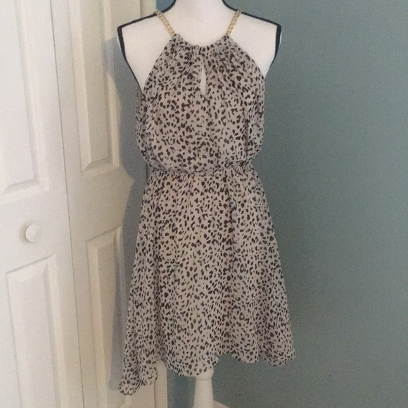 Forever 21 Dresses & Skirts - Light Tan and leopard Printed High Low Dress.